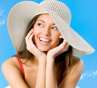 smiling woman in summer hat